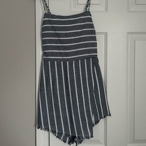 Vestique blue and white striped romper with open back. Size medium
